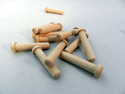 Wooden axle pegs